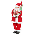 Red Santa Claus figure holding a gift box with a green elf on his shoulder on a white background