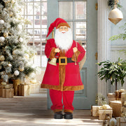Animated Santa Claus figure standing in a hallway beside a decorated Christmas tree and gifts