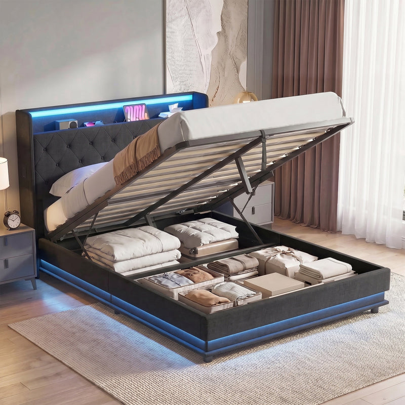 Double ottoman bed with the base lifted showing folded bedding and clothes underneath