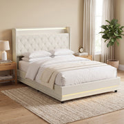 Double ottoman bed frame styled in a bedroom with soft bedding and cushions