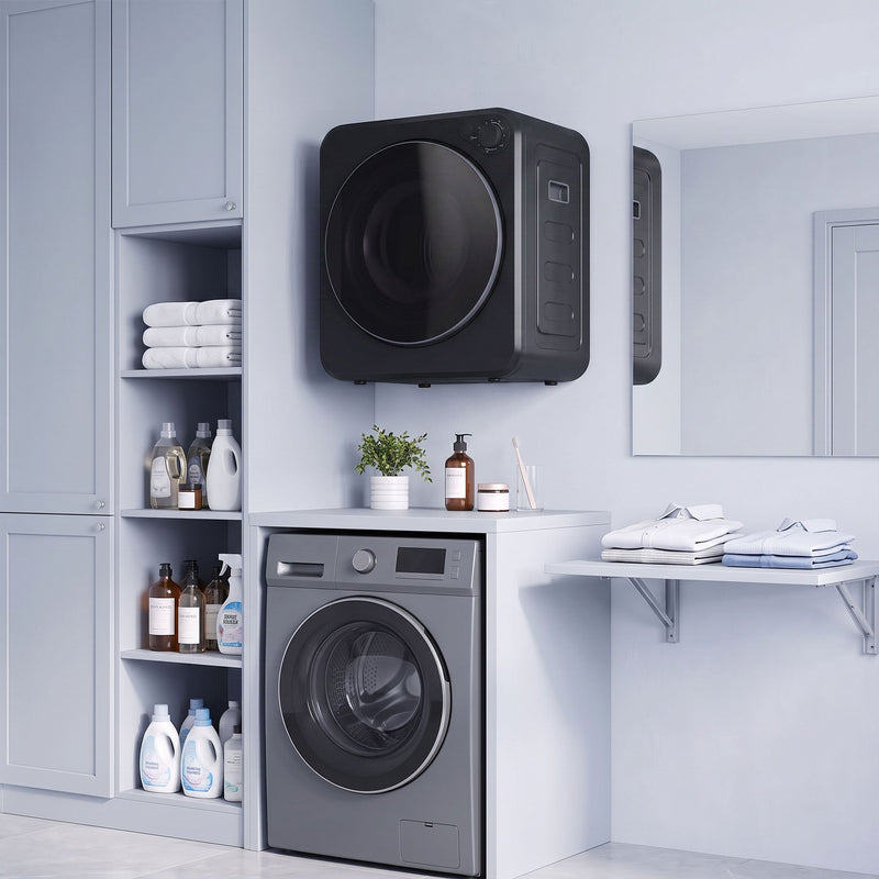 Black tumble dryer wall-mounted above a laundry shelf