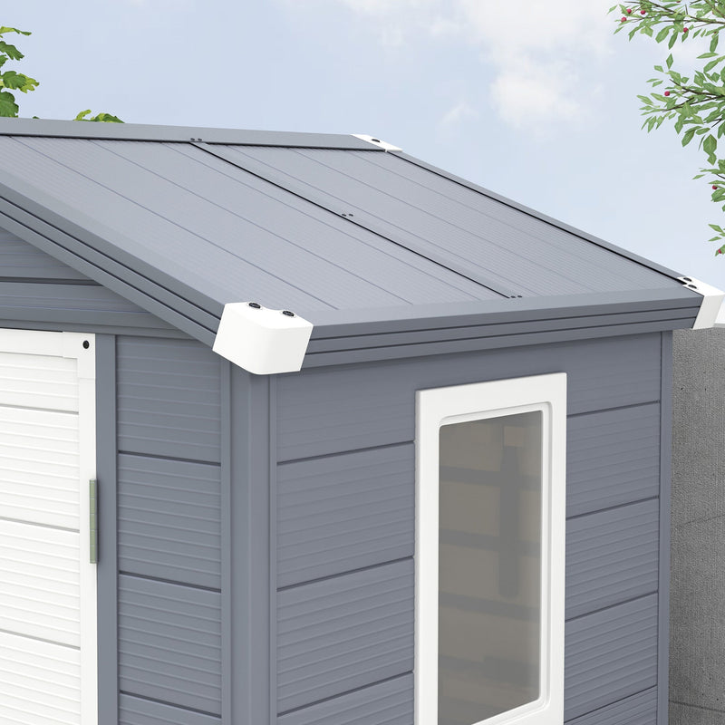 Close-up of the apex roof panels, white corner caps and the window frame