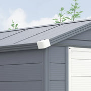 Close-up of the apex roof ridge panels and the white gable vent