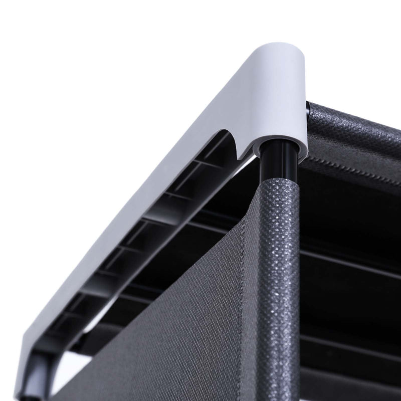 Close-up of the metal tube frame joined by a pale plastic corner connector