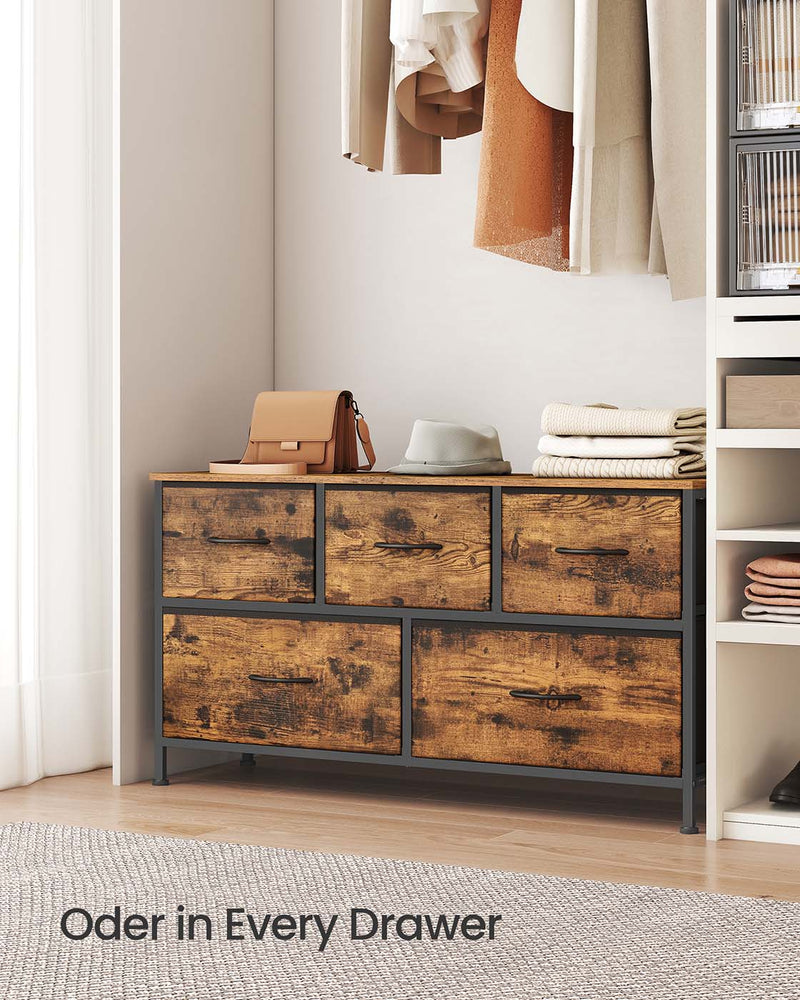 Close-up of large and small drawer fronts on the chest