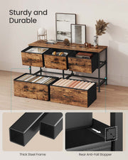 Open large drawer showing folded clothes storage