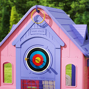 Close-up of the dartboard target and ring toss hook on the playhouse gable