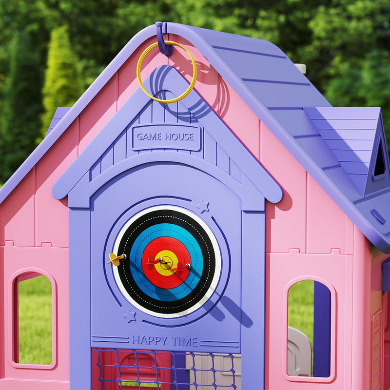 Close-up of the dartboard target and ring toss hook on the playhouse gable