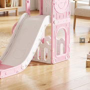 Close-up of the pink slide chute and cream climbing frame from the side