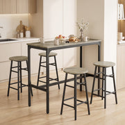 Bar table and stool set styled in a bright kitchen