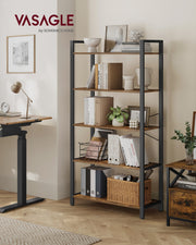 Bookcase styled in a room corner beside a height adjustable desk