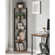 Corner shelf beside a desk in a home office holding books, a clock and plants