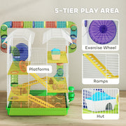 Close-up of the exercise wheel, ramps and hut inside the green hamster cage