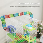 Close-up of the connecting play tunnel on the green hamster cage with a hamster inside