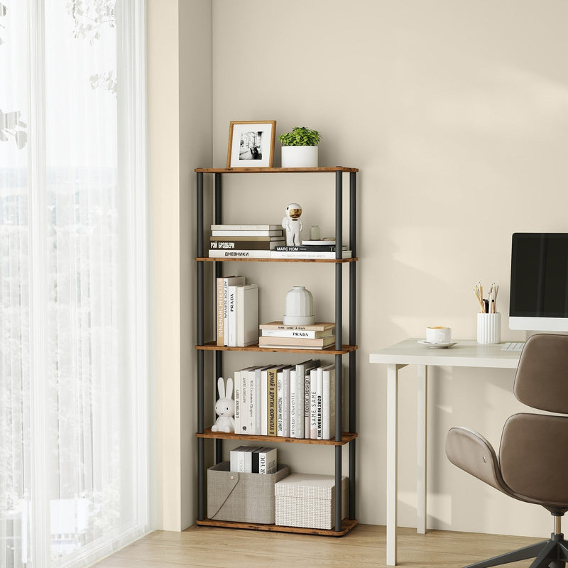 The shelf unit filled with books and boxes in a home office corner next to a white desk and window