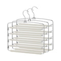 Three Songmics 5-tier swivel pants organisers with non-slip foam bars, stacked view on white background