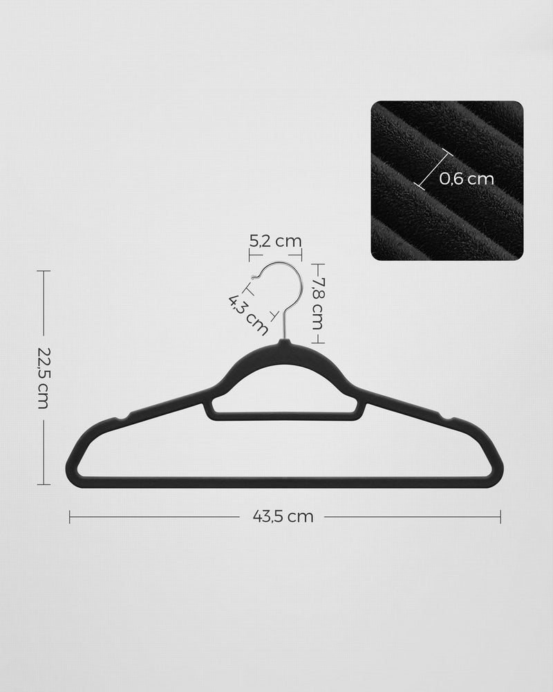Dimension diagram of the black velvet hanger showing 43.5 cm width, 22.5 cm height and 0.6 cm thickness