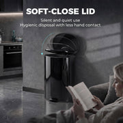 Soft-close lid of the black pedal bin closing quietly in a kitchen