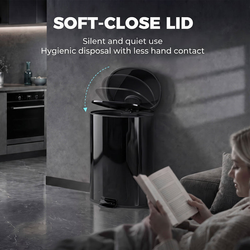 Soft-close lid of the black pedal bin closing quietly in a kitchen