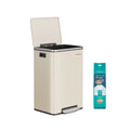 Cream steel kitchen bin with lid open beside a pack of compatible bin bags