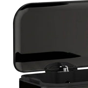 Close-up of the open black lid and hinge on the pedal bin