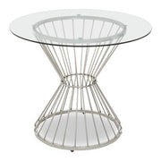Clear glass round dining table with silver hourglass base, front view