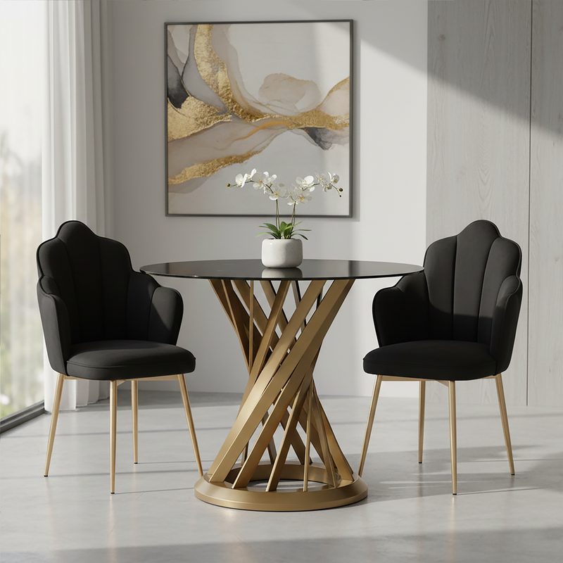 Black glass round dining table with gold hourglass base in a modern dining room