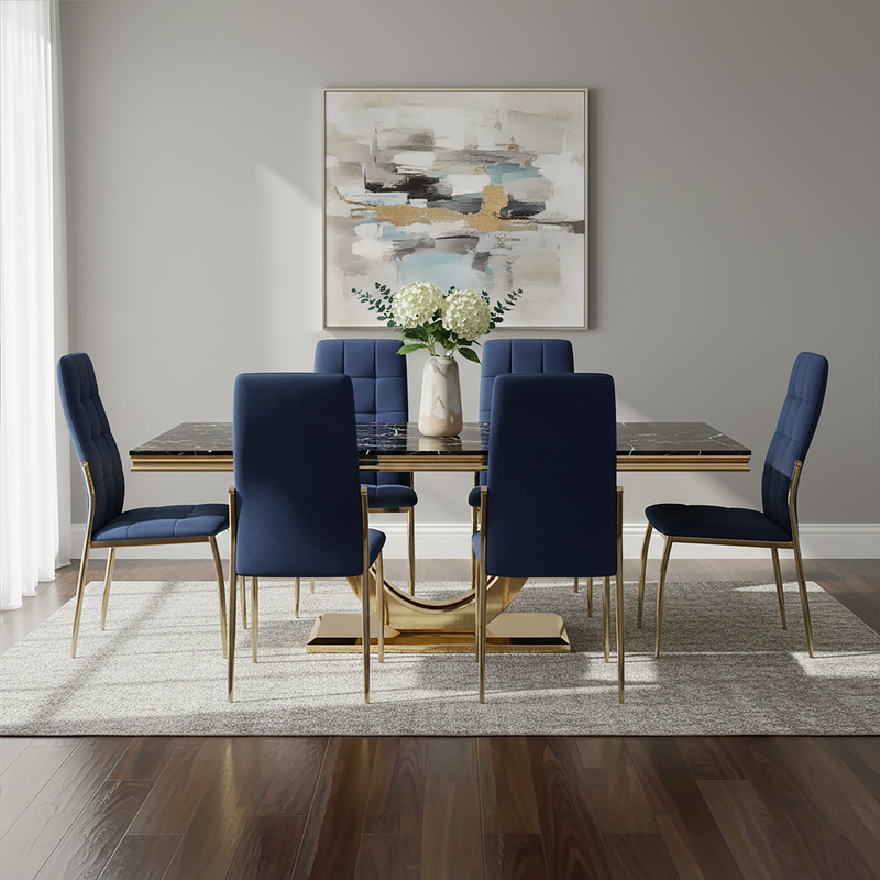 Black faux marble dining table with brushed gold pedestal styled with dining chairs