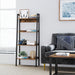 Image of a Vasagle 5 shelf ladder bookcase. This bookcase has a black steel frame with rustic brown shelve and a back panel to prevent items falling off.