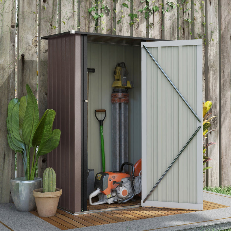 Brown shed against a fence with the door open showing a chainsaw, spade and tools inside