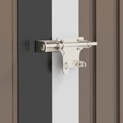Close-up of the metal slide bolt latch fitted to the front of the shed door