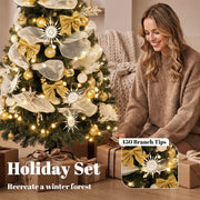 Smiling woman beside the tree with a close-up callout of the 450 branch tips and gold bows