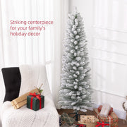 Snowy pencil Christmas tree beside a white armchair and gifts with a striking centrepiece caption