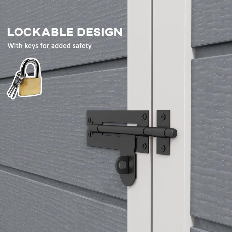 Close-up of the lockable door latch on the shed with a padlock and keys beside it