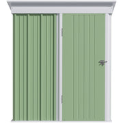 Straight-on front view of the green shed showing the white door frame, ribbed panels and door latch