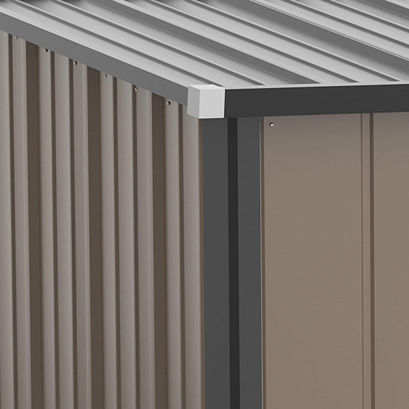 Close-up of the shed roof edge and eave overhang above the brown corrugated side panel
