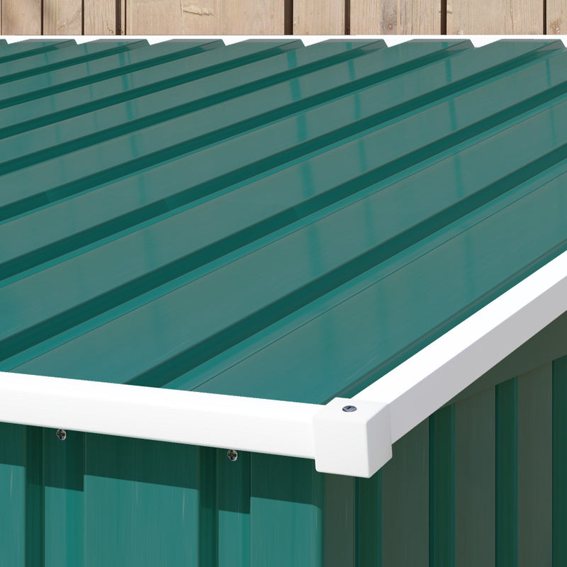 Close-up of the green corrugated roof panels and the white capping strip along the roof edge
