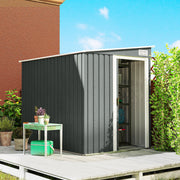 Grey metal shed on decking with the sliding door open and pot plants beside it