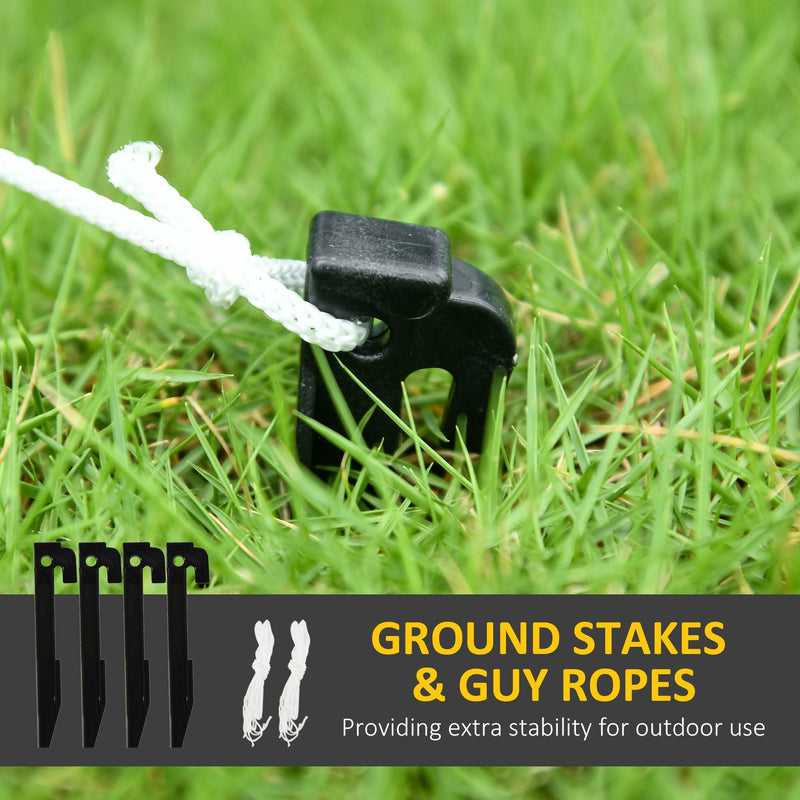 Black ground stake with white guy rope in grass above four stakes and two ropes