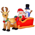 Inflatable reindeer pulling a red sleigh with Santa and a snowman in a top hat on a white background