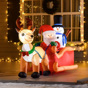 Lit inflatable reindeer, Santa and snowman in front of a window with fairy lights