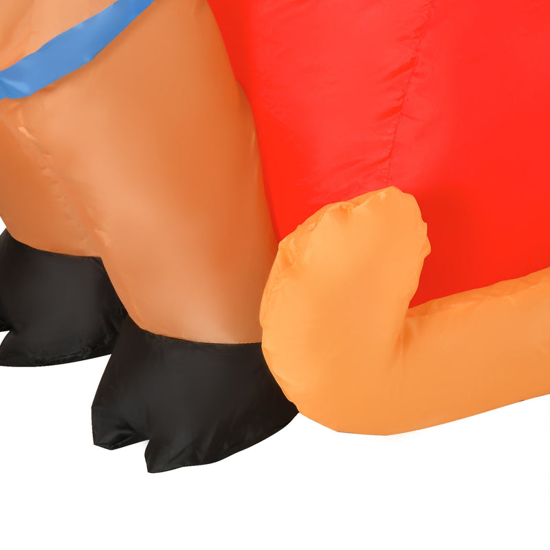Close-up of the reindeer legs and the red sleigh side