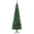 Green slim pencil Christmas tree with pine cones on a black metal stand, white background