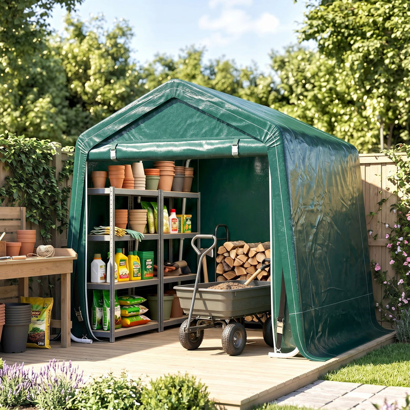 Green shed on a patio storing plant pots, shelves, a wheelbarrow and firewood