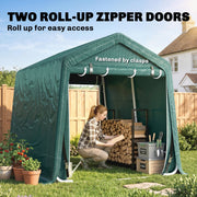 Green shed with two roll-up zip doors fastened by clasps while a woman stacks firewood