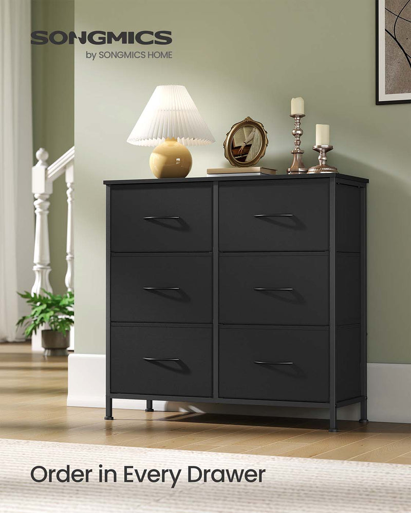 Close-up of a fabric drawer front on the chest