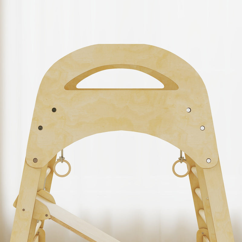 Close-up of the arched frame top with hanging gymnastics rings