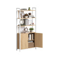 Golden oak and matte white 6-tier bookcase with a 2-door cabinet on a plain background