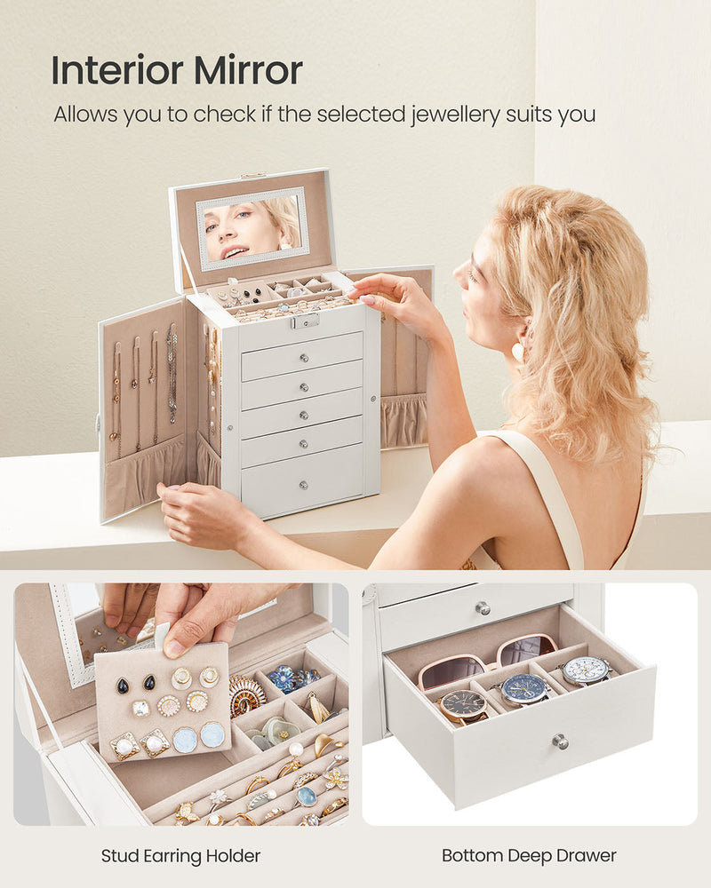 Woman checking her reflection in the lid mirror, with the stud earring holder and deep bottom drawer