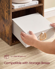 Storage box up to 27 cm wide being slotted onto a shelf of the bookcase